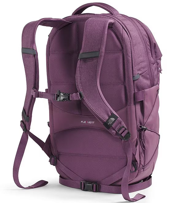 A purple The North Face Fleece Vent backpack shown from the back, featuring padded shoulder straps, compression buckles, and multiple zippered compartments on a white background.