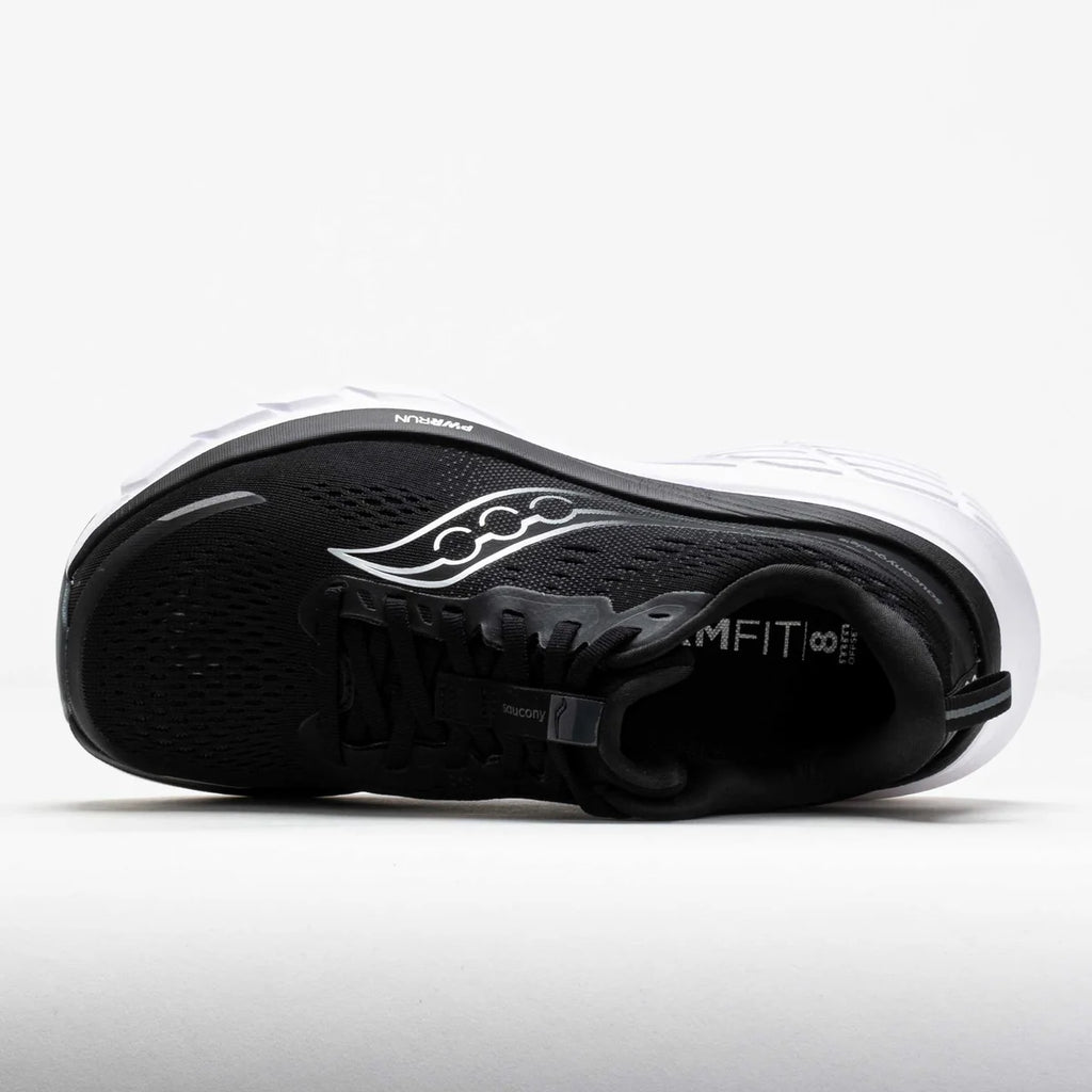A side profile view of a Saucony running shoe in black and white, showcasing the textured black mesh upper, black laces, and the white Saucony logo on the side of the midsole.