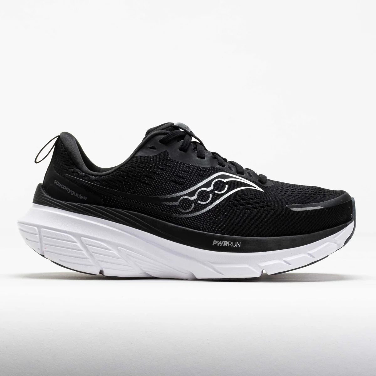 Black running shoe with white sole on a light gray background
