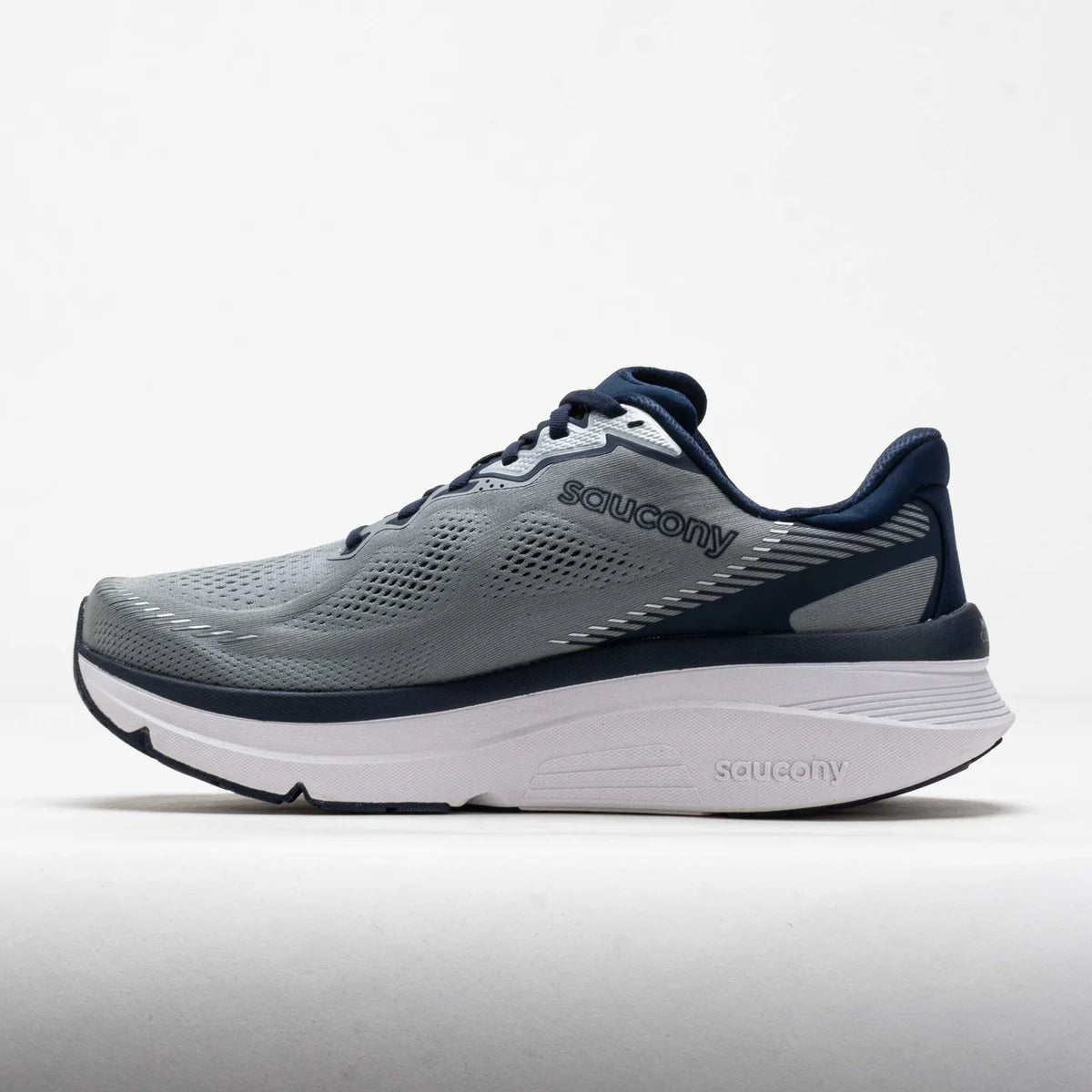 Gray and navy running shoe with 'Saucony' branding on a white background