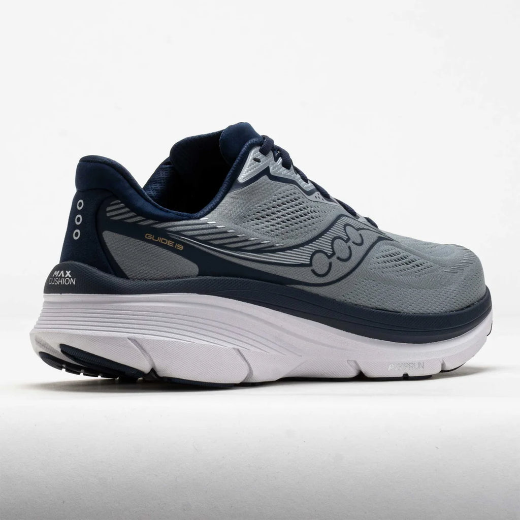 A Saucony Glacé-13 running shoe in gray and navy blue, shown from a side profile view against a clean white studio background.