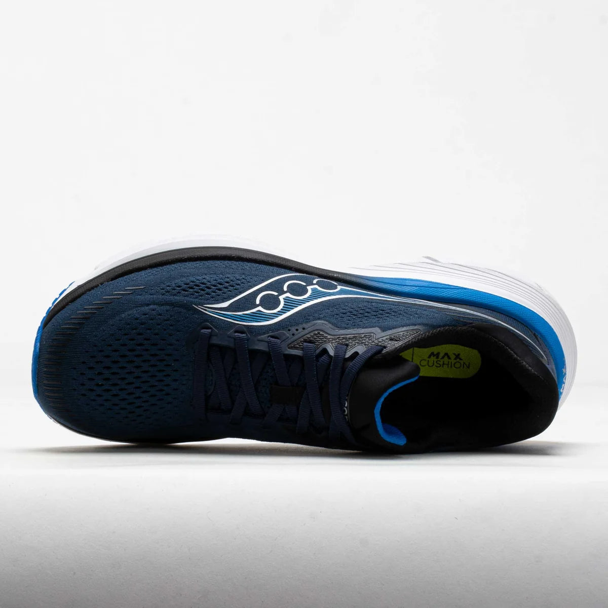 A single Saucony running shoe shown from the lateral side profile against a light gray studio background. The shoe features a dark navy blue mesh upper, a white Saucony wave logo, a bright blue midsole accent, and a black collar with a lime green 'MAX GEL' label.