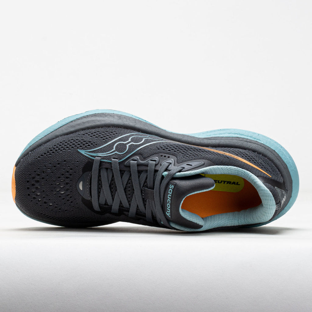 Gray running shoe with orange accents on a white background