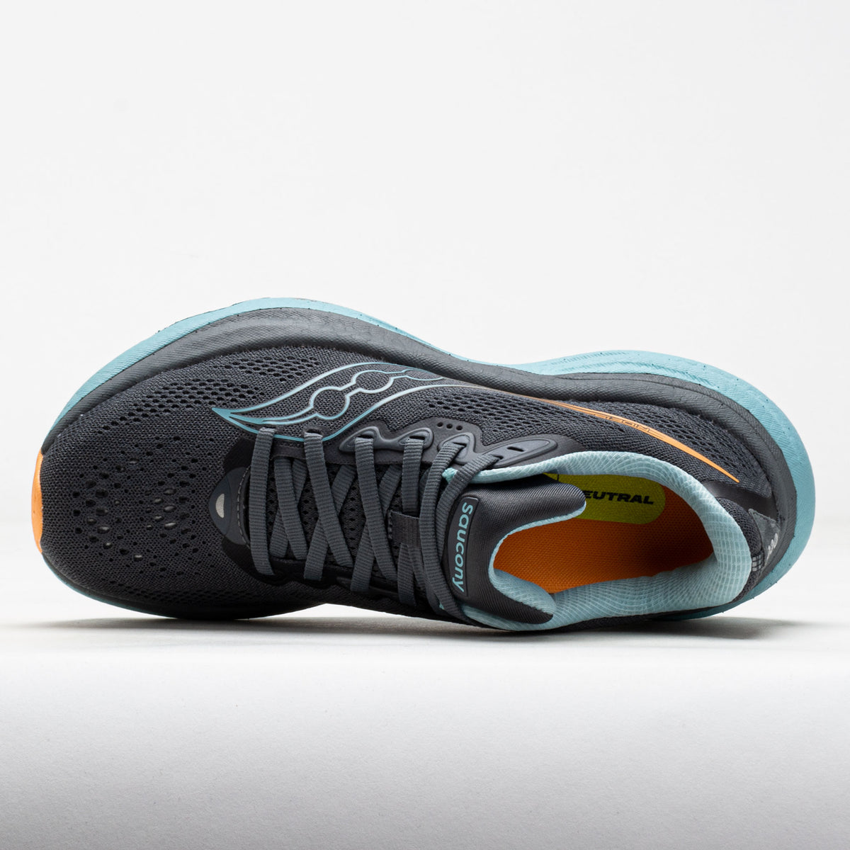 Gray running shoe with orange accents on a white background