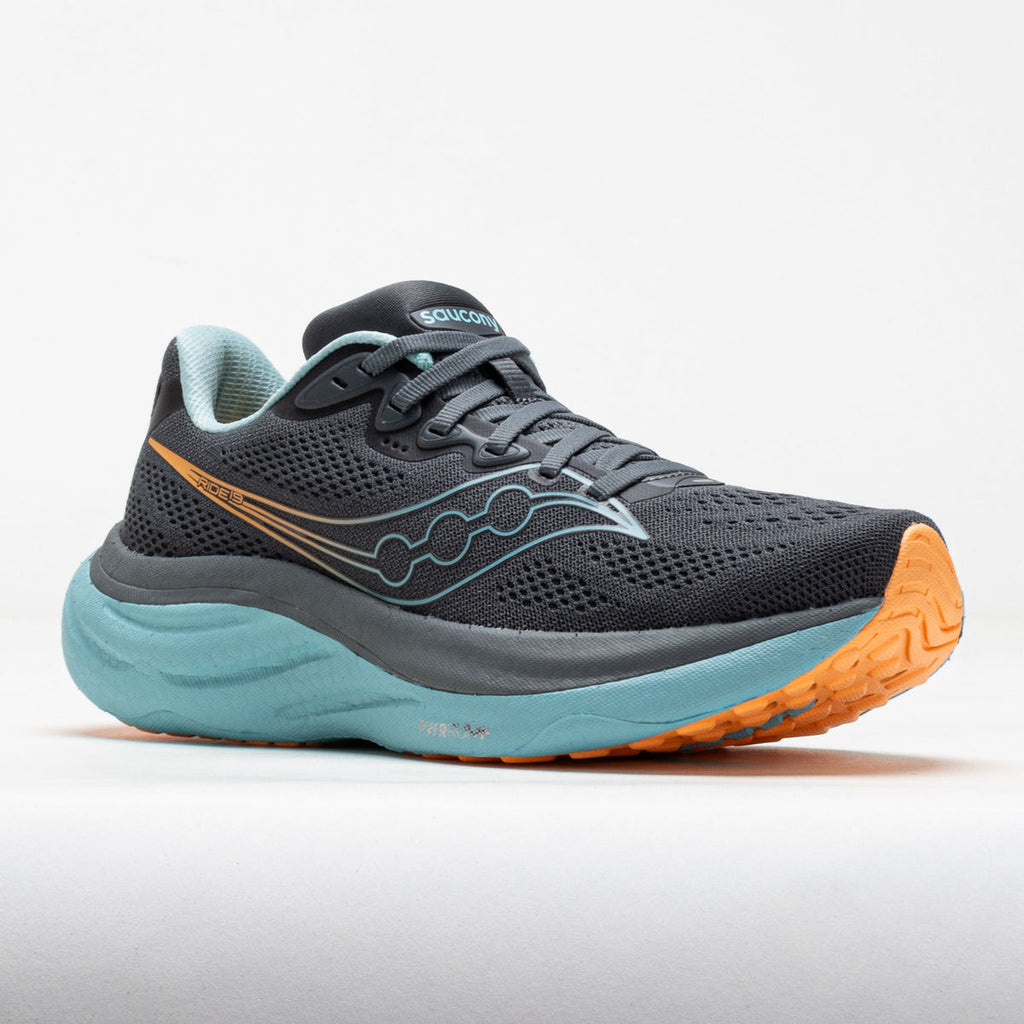 Saucony running shoe with black, blue, and orange design on a white background