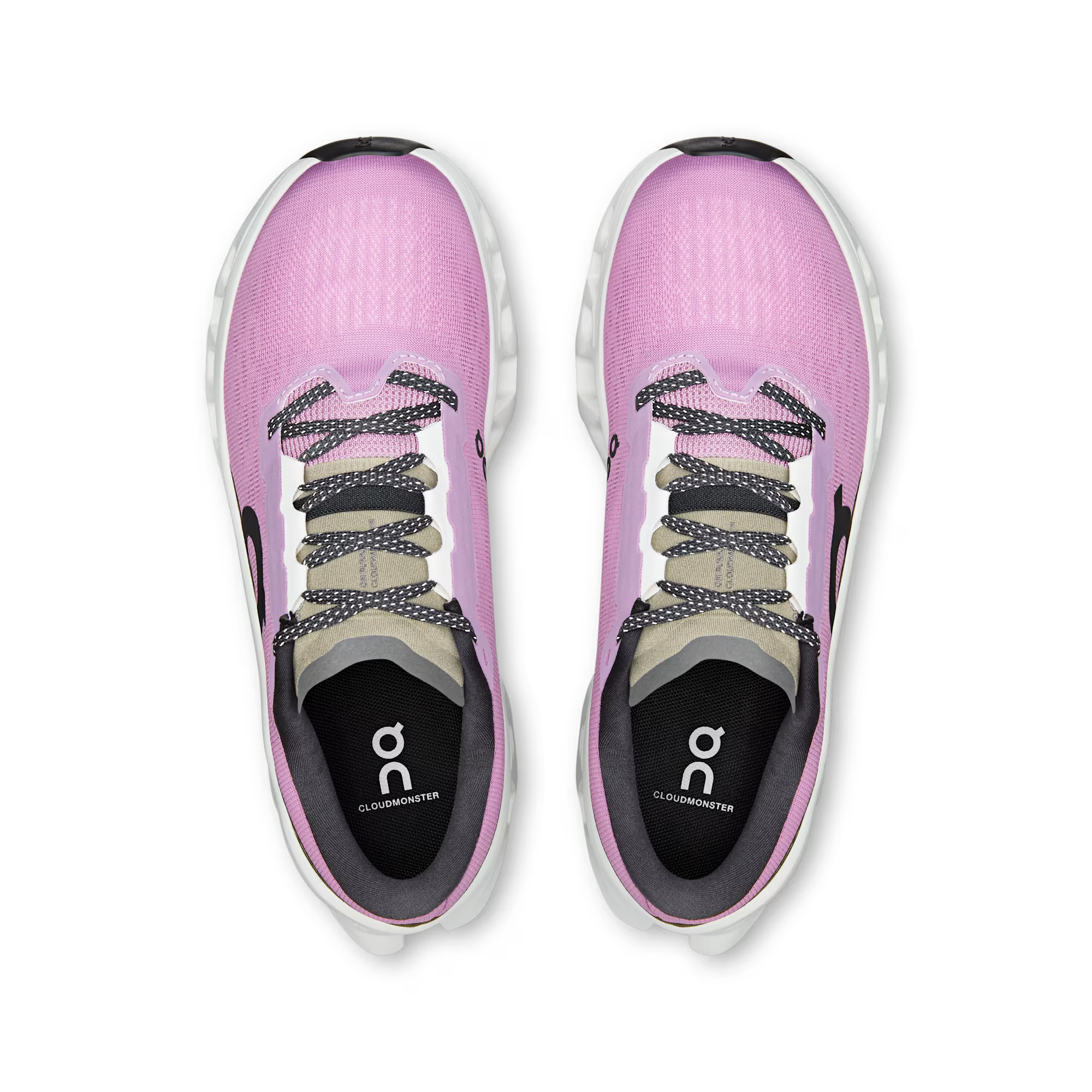 Pink athletic shoes with a visible brand logo on a white background