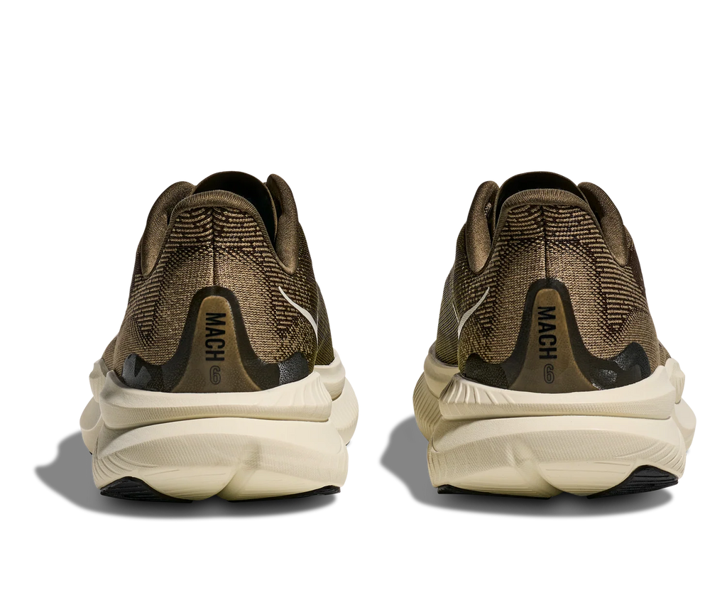 A pair of running shoes shown from the back, featuring a textured metallic bronze and brown knit upper with a thick cream-colored midsole and black heel details.