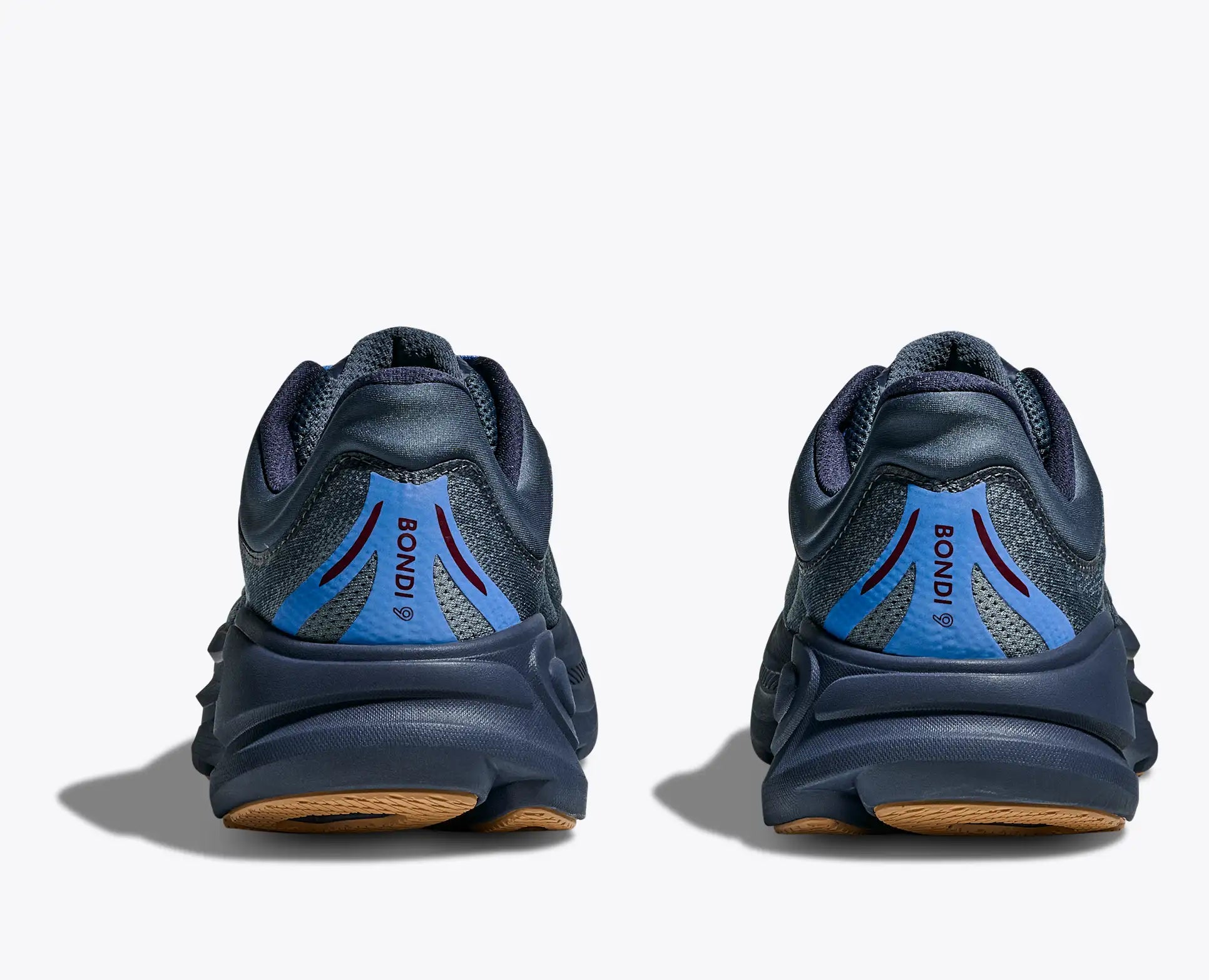 Pair of navy running shoes with blue accents on a white background