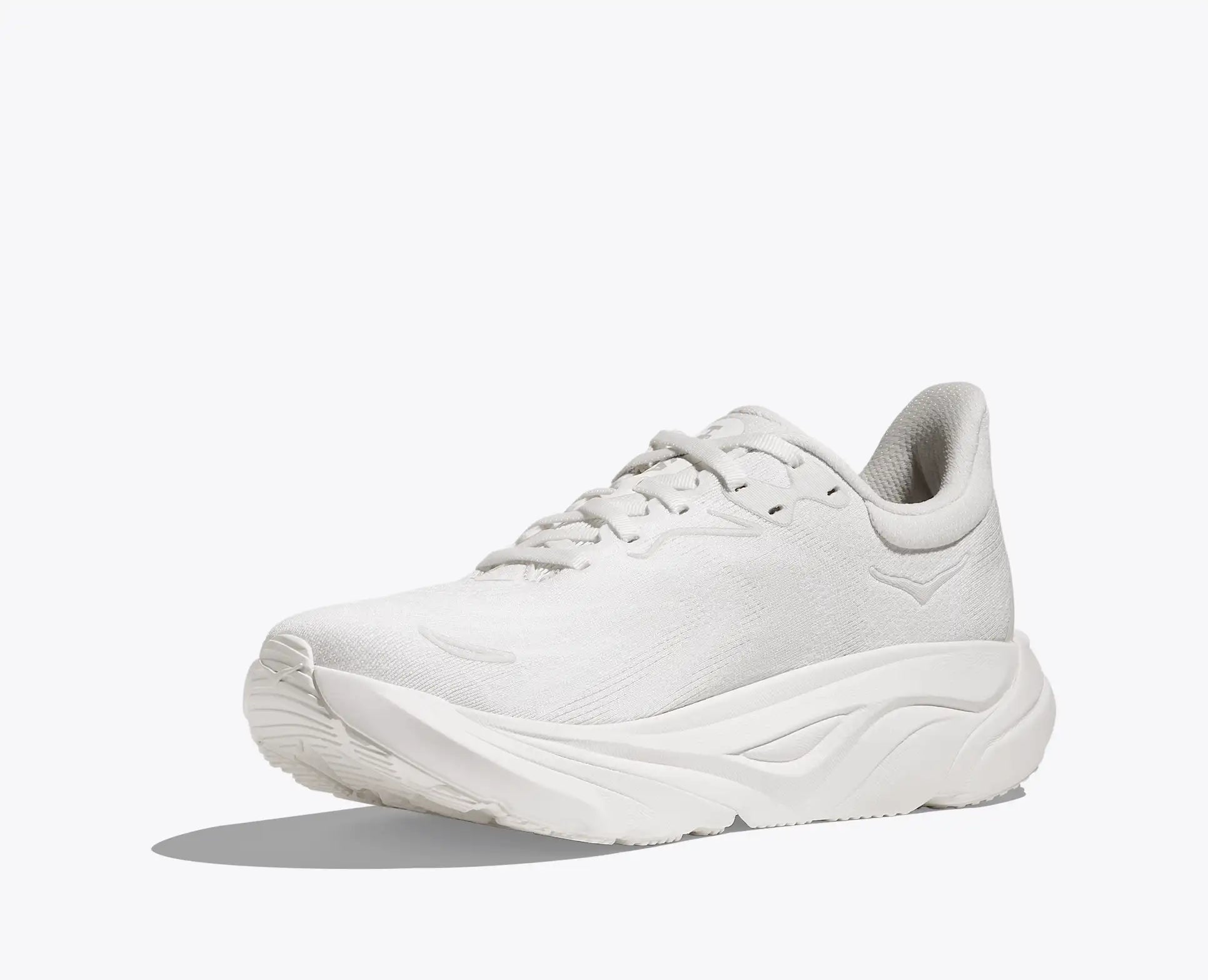 White athletic shoe on a light gray background