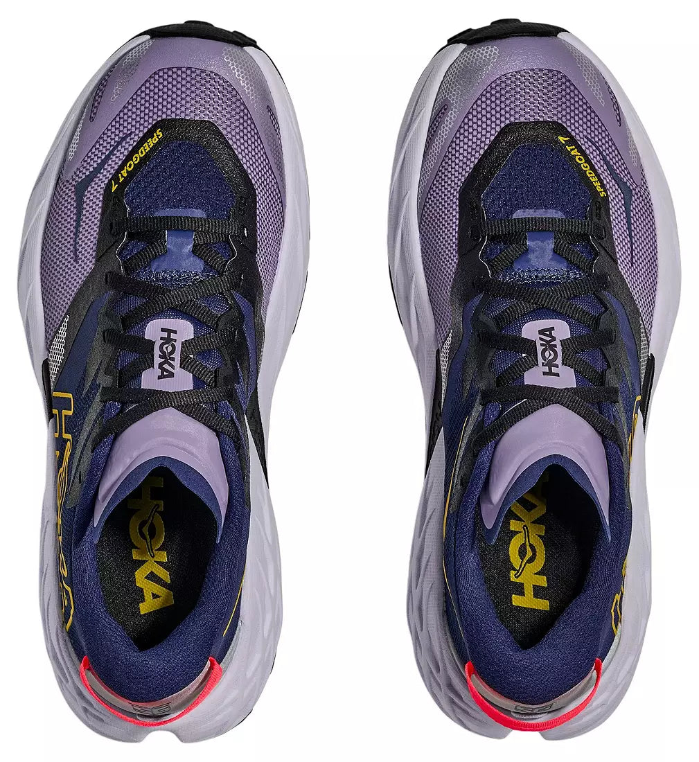 Pair of Hoka running shoes on a white background
