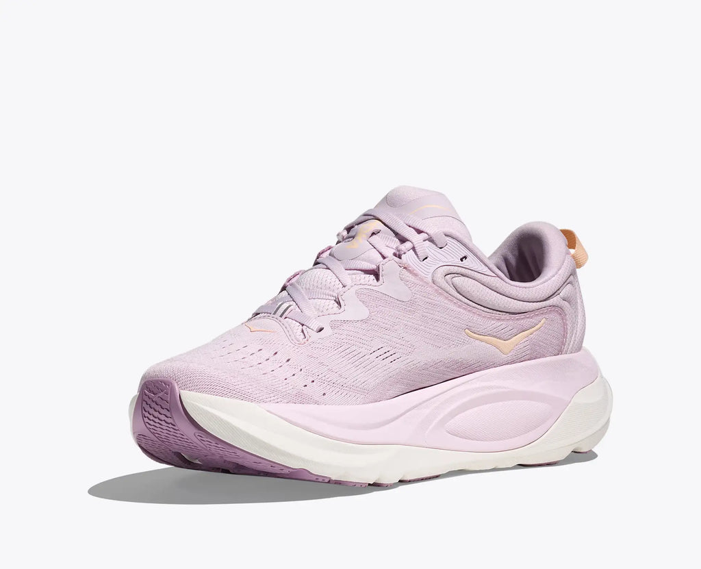 Purple sneaker with white sole on a light gray background
