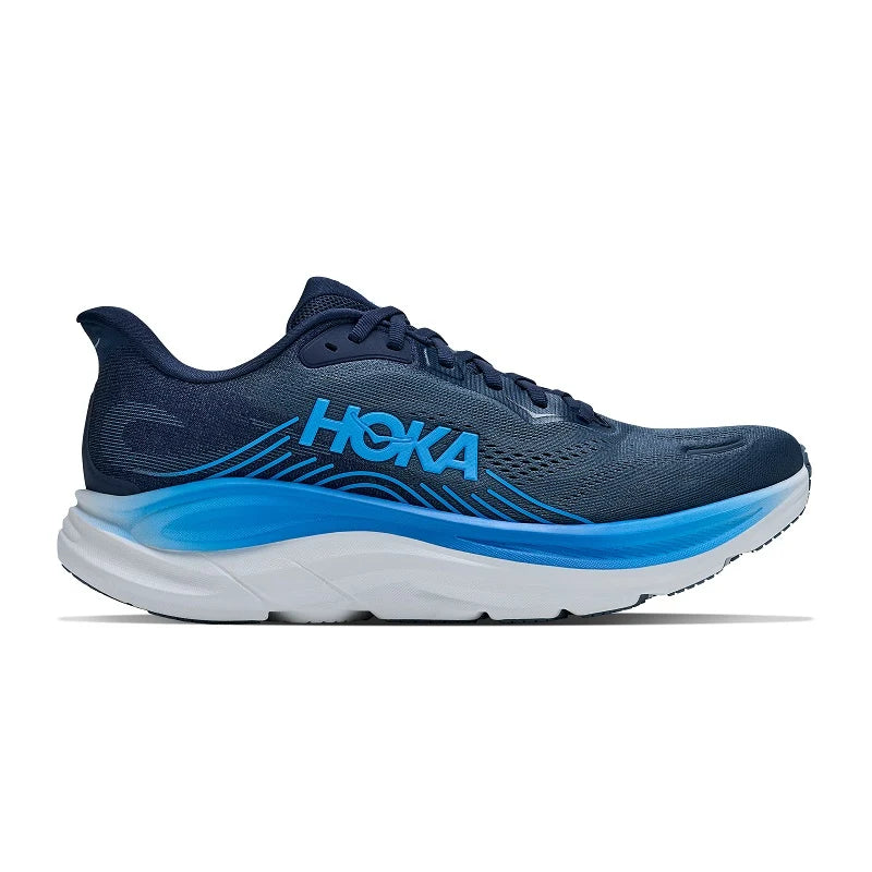 Blue running shoe with white sole on a white background