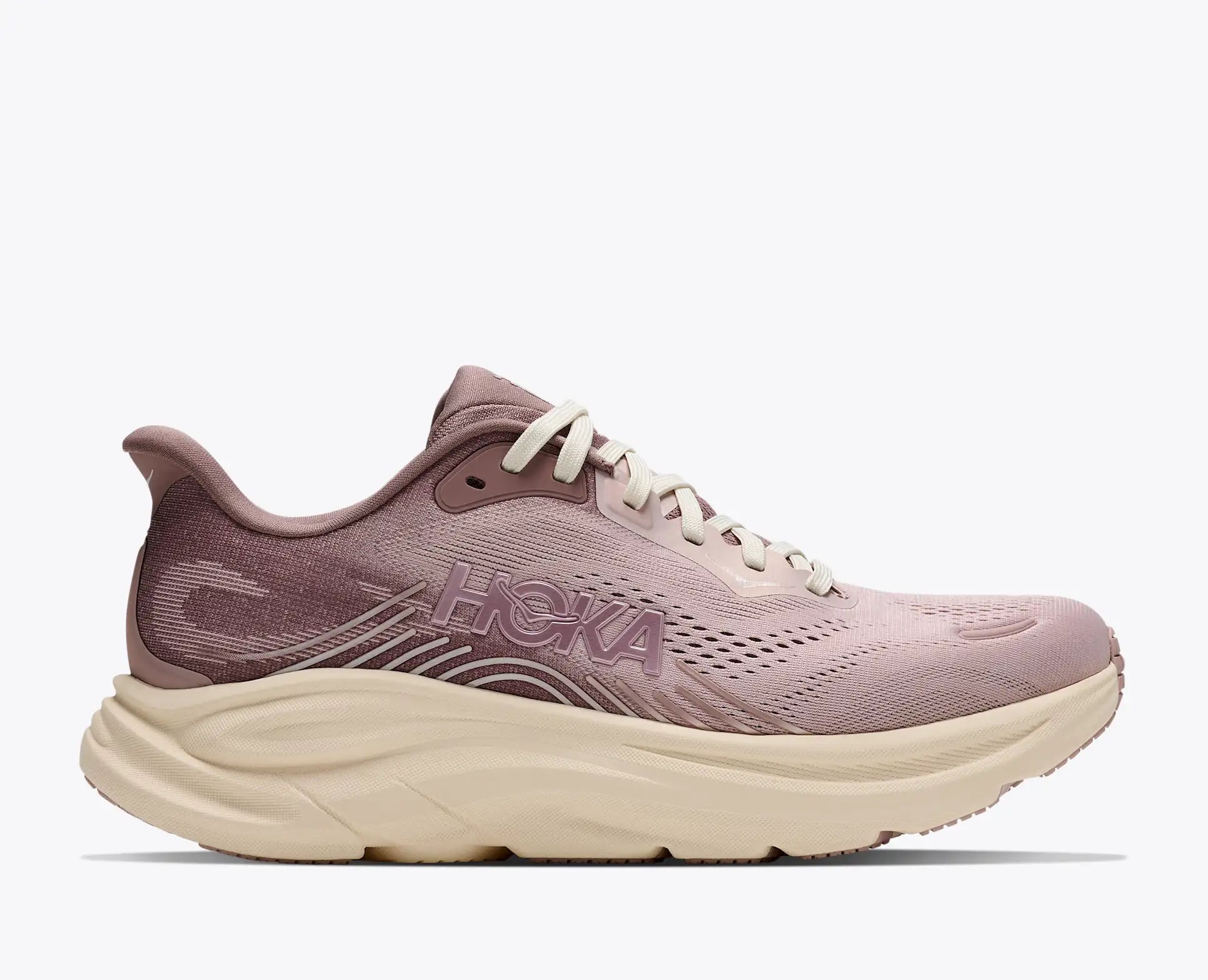A Hoka running shoe in a dusty mauve pink colorway with a chunky cream-colored midsole and white laces, shown from a side profile on a light gray background.