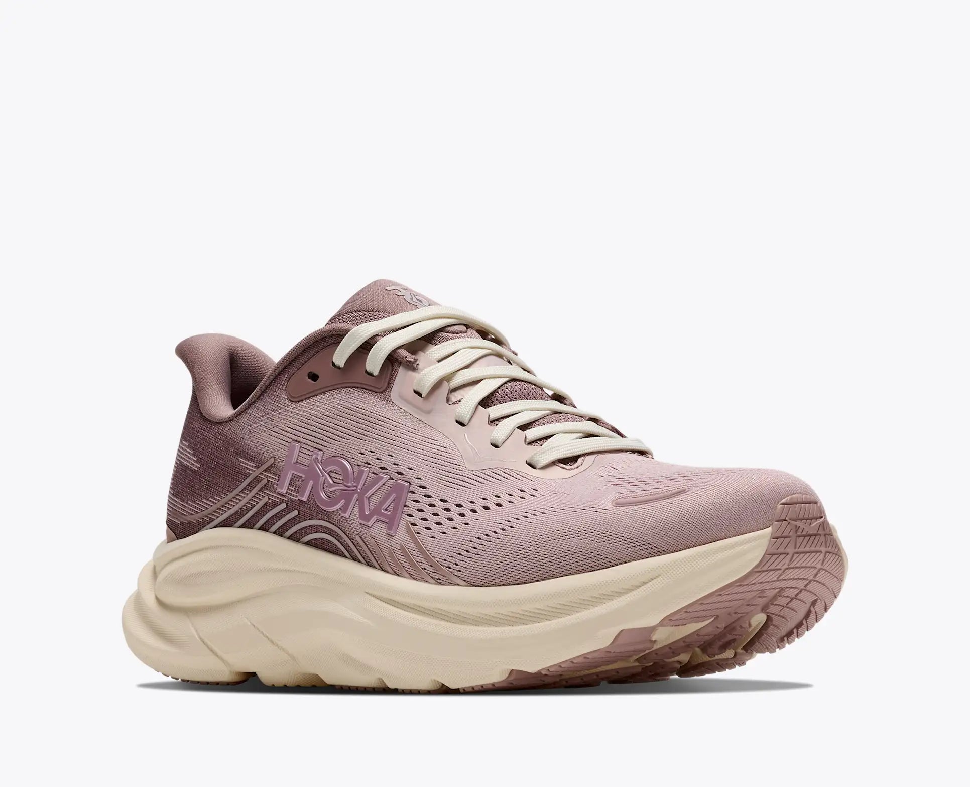 A Hoka running shoe in a dusty mauve pink and cream colorway, shown from a side profile against a clean white background.