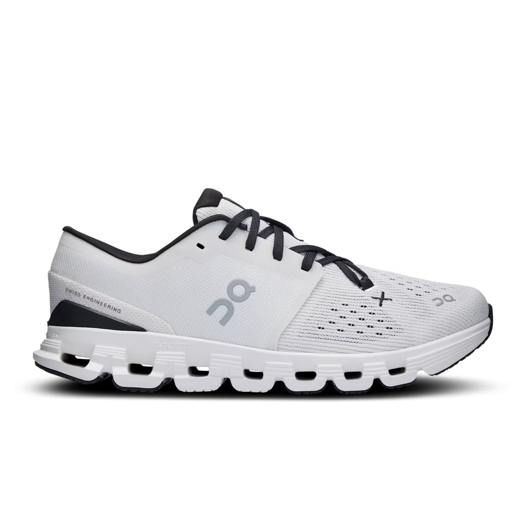 White running shoe with black accents on a transparent background