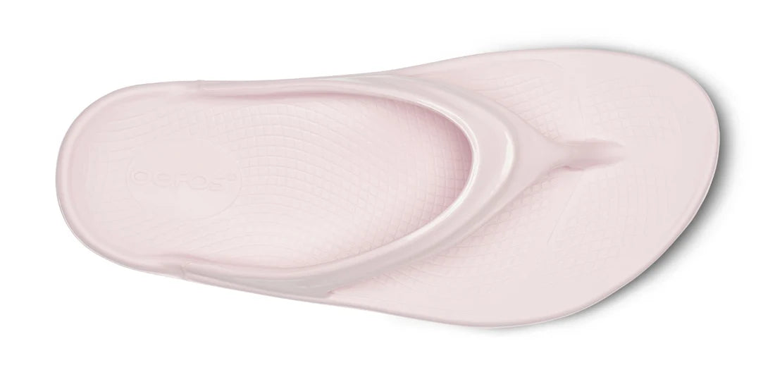 Pink sandal on a white background