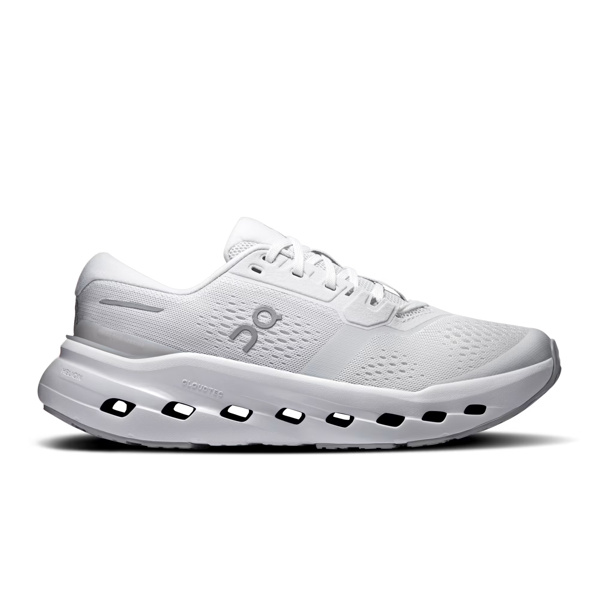 Gray and white sneaker with Nike logo on a black background