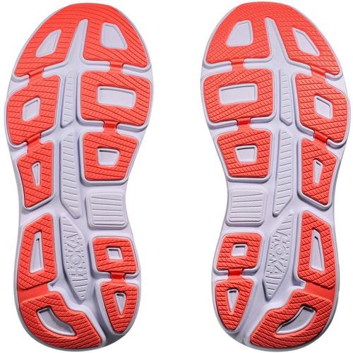 Close-up of orange and gray shoe soles on a white background