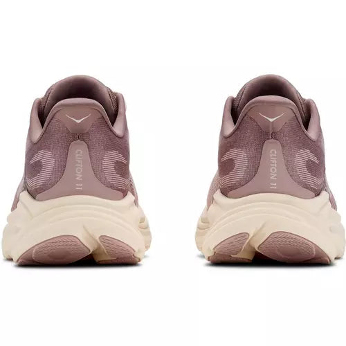 A pair of Citron 11 sneakers shown from the back, featuring a dusty mauve-pink upper and a chunky cream-colored midsole.