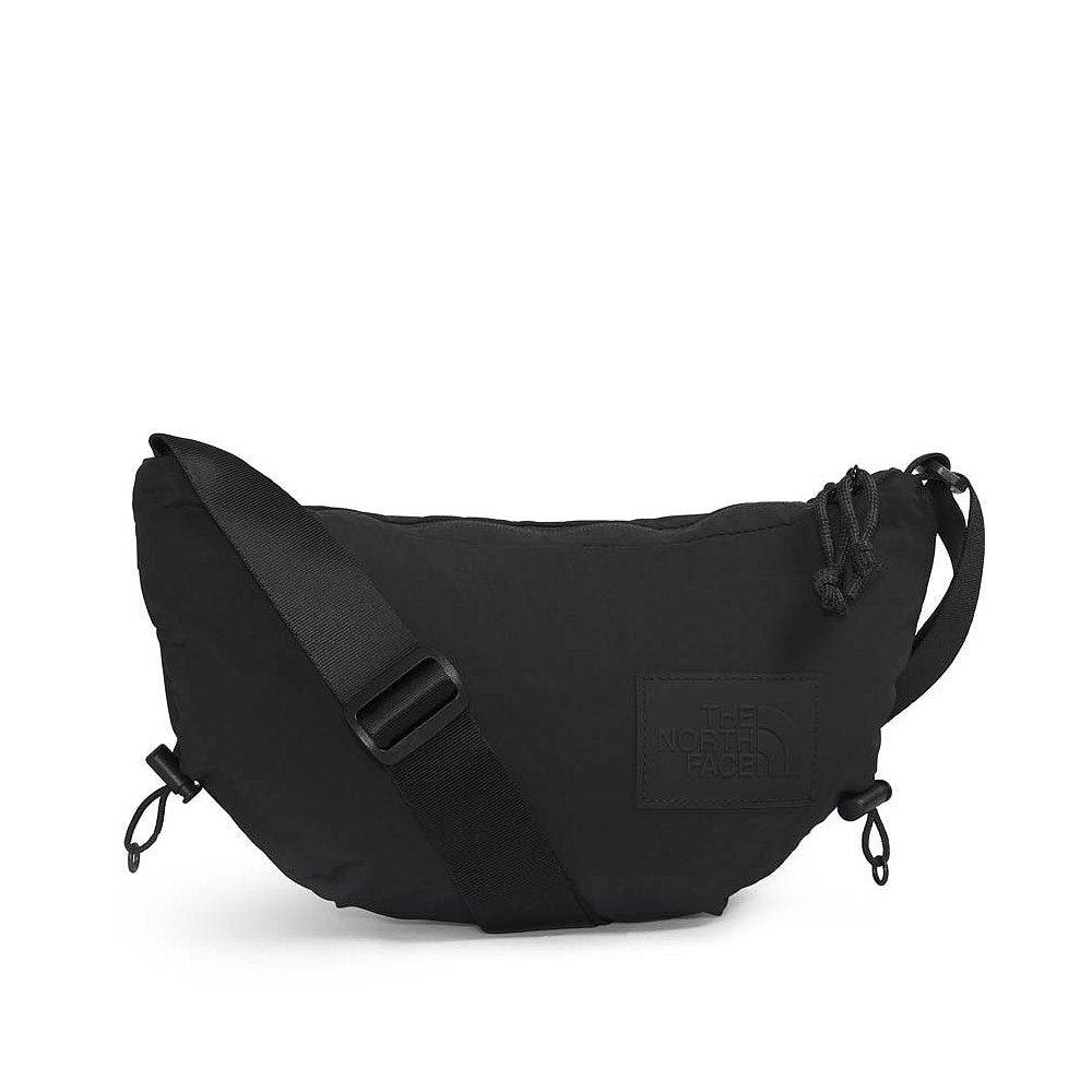 Black crossbody bag with a visible brand logo on a white background