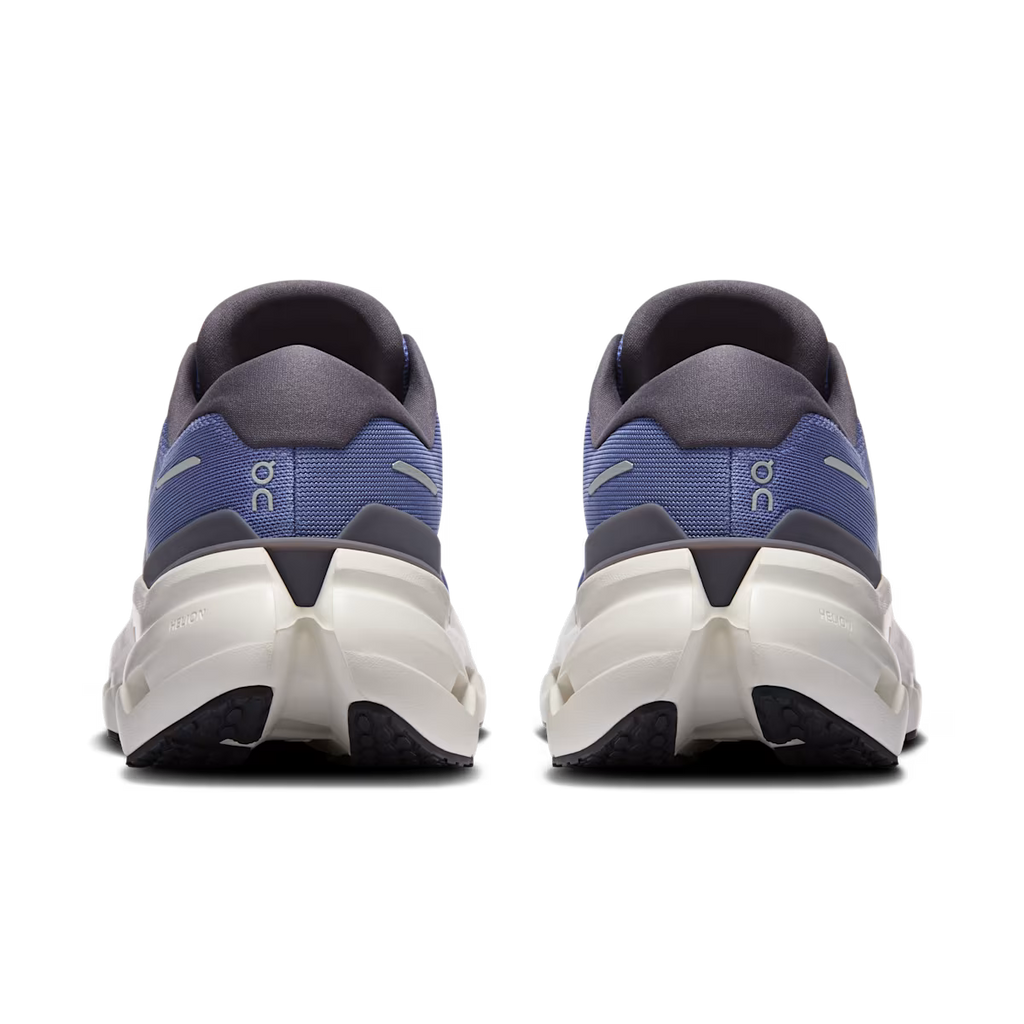Pair of blue and gray athletic shoes on a white background