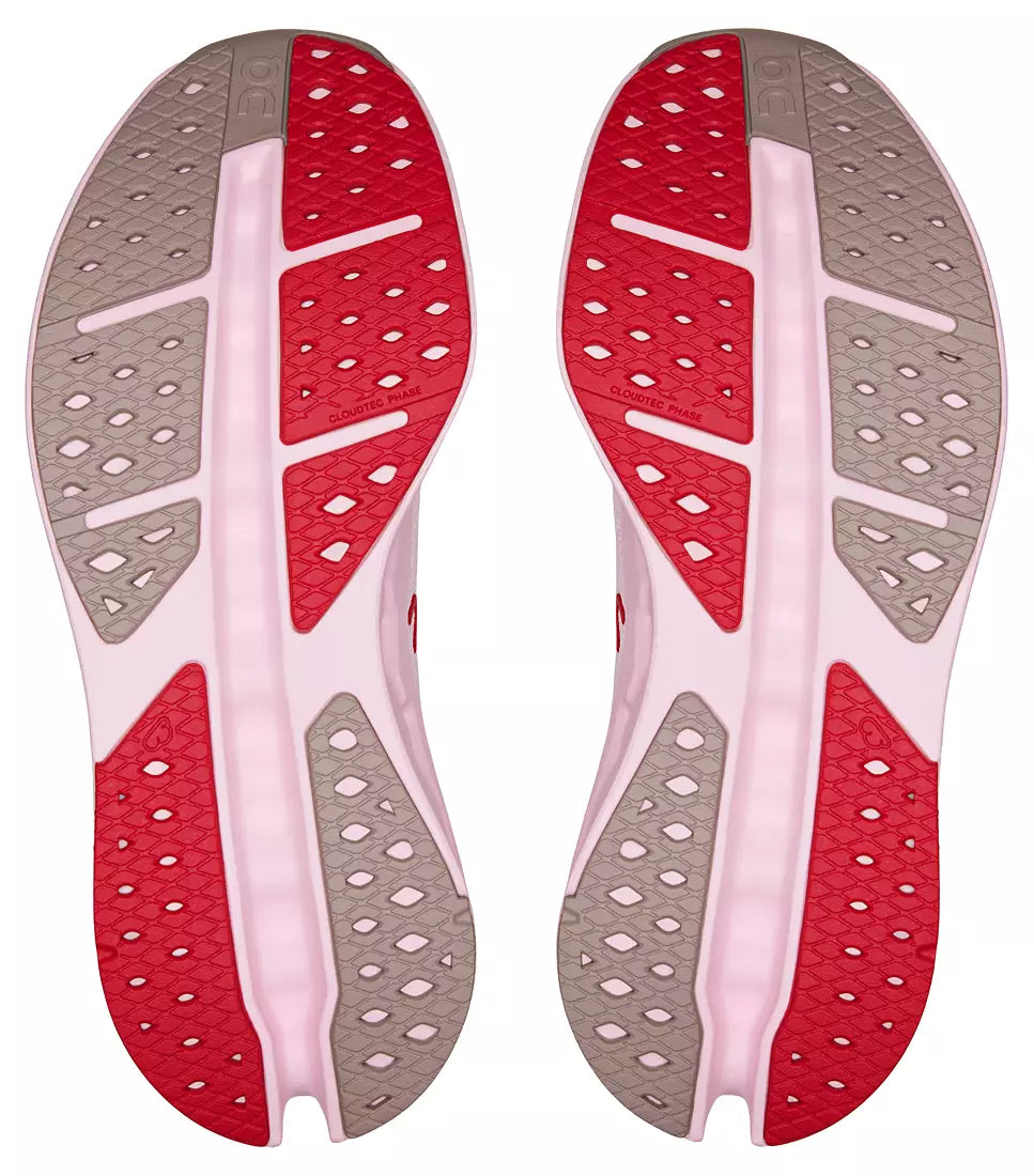 Red and gray shoe insoles on a white background