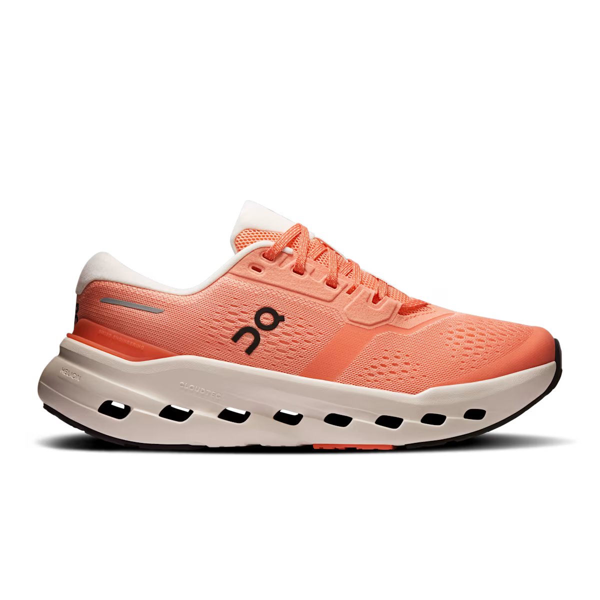 Coral running shoe with white sole on a transparent background