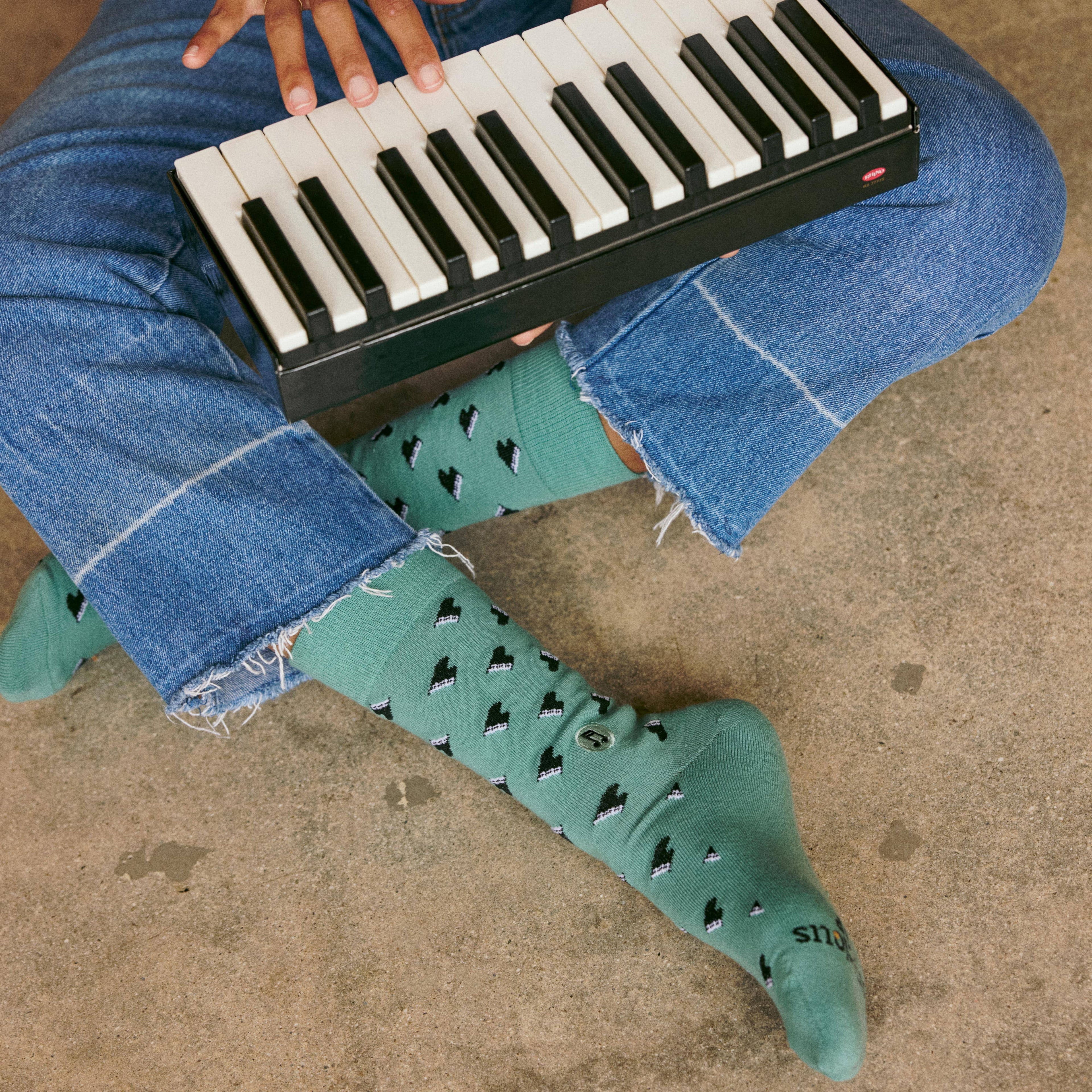 Socks that Support Music (Green Pianos)