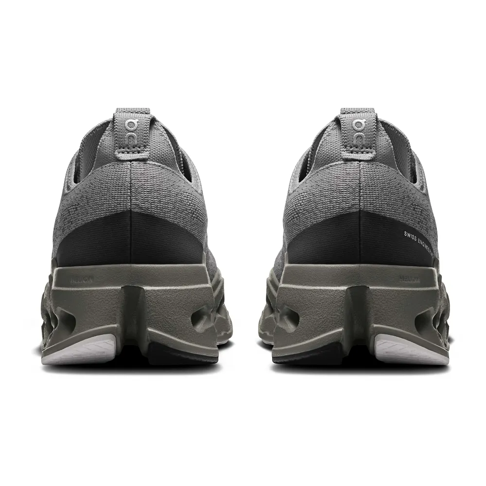Gray hiking shoes with sole pattern on a white background