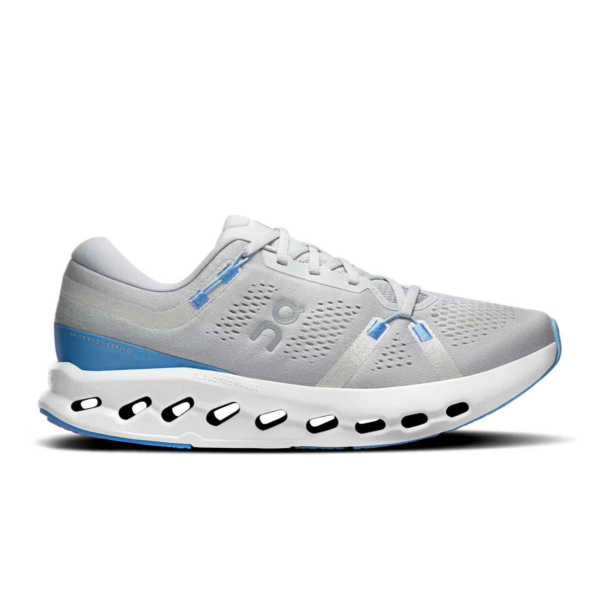 Gray running shoe with blue sole on a white background