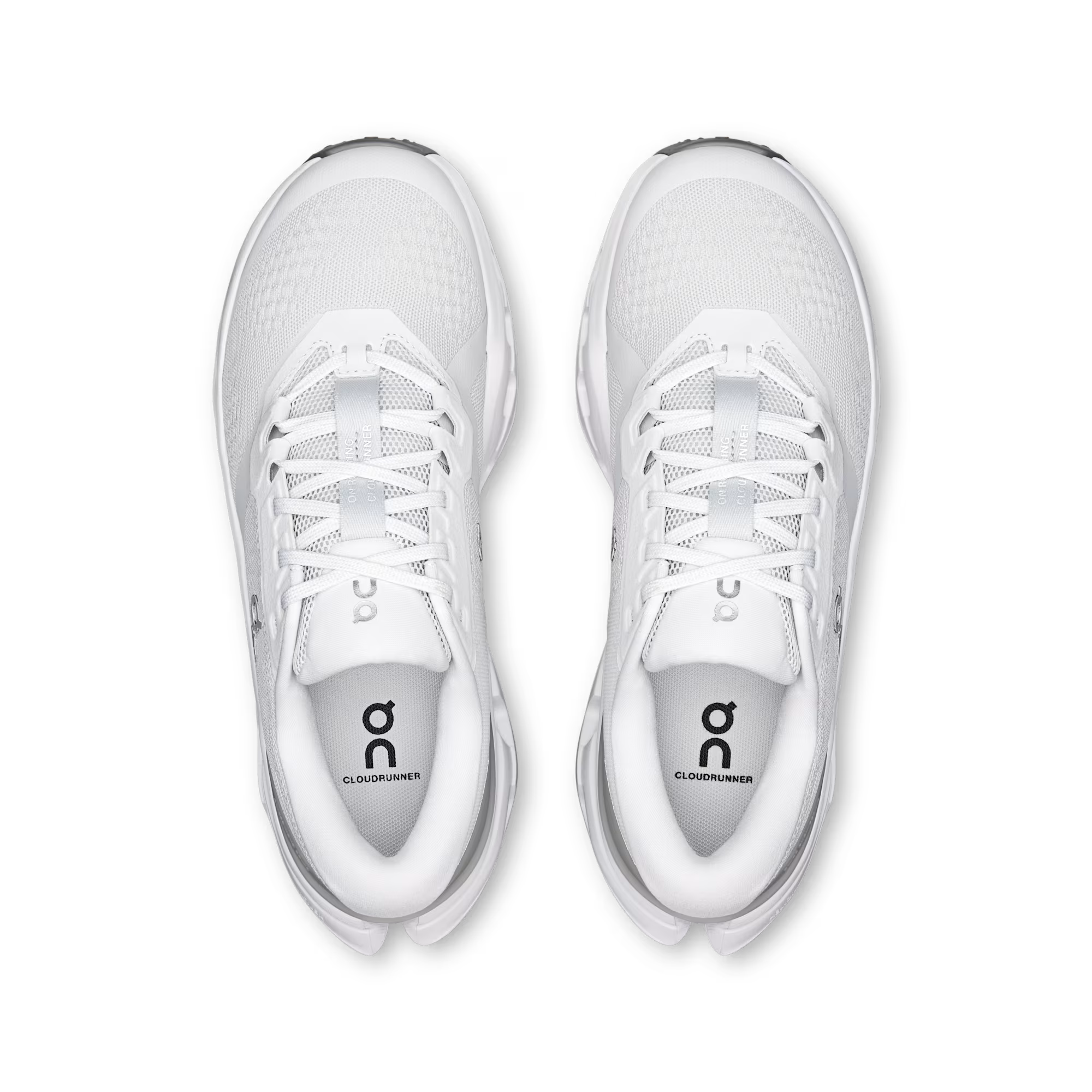 White running shoes with a brand logo on a transparent background