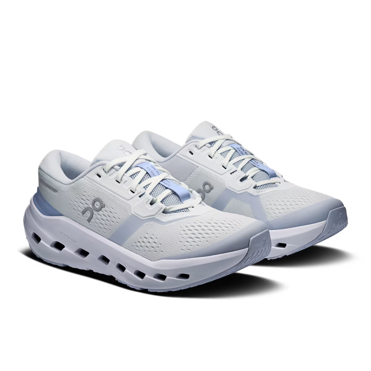 Pair of light gray running shoes on a white background