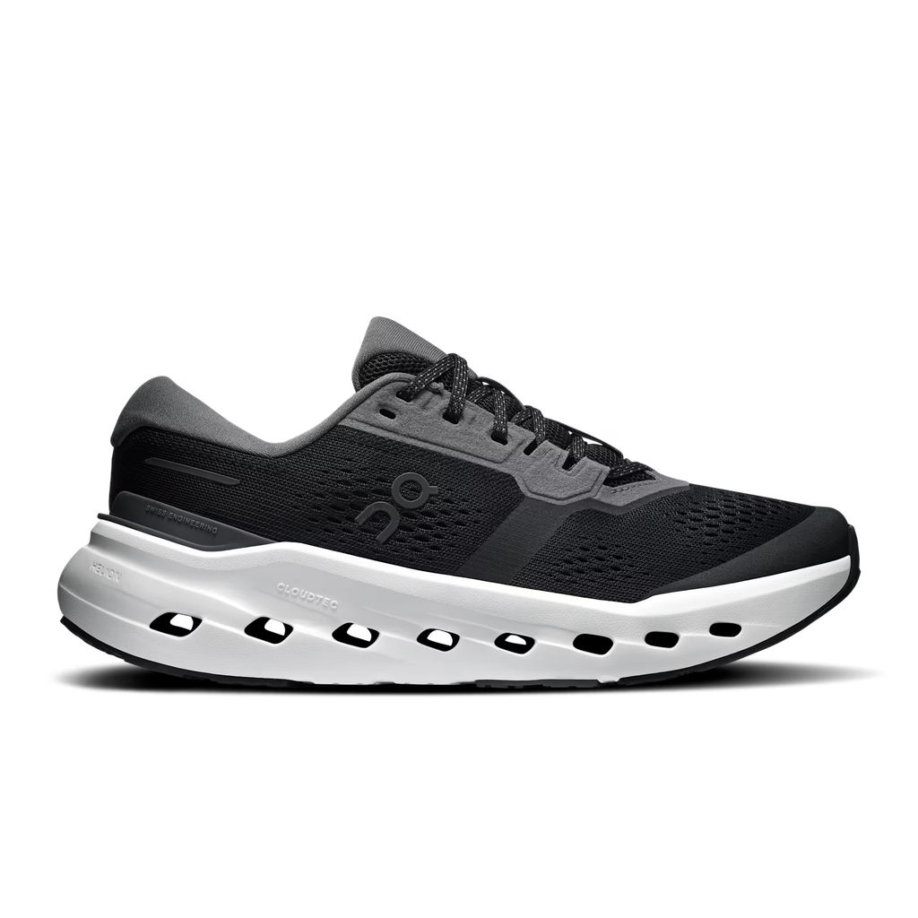 Black and gray running shoe on a white background