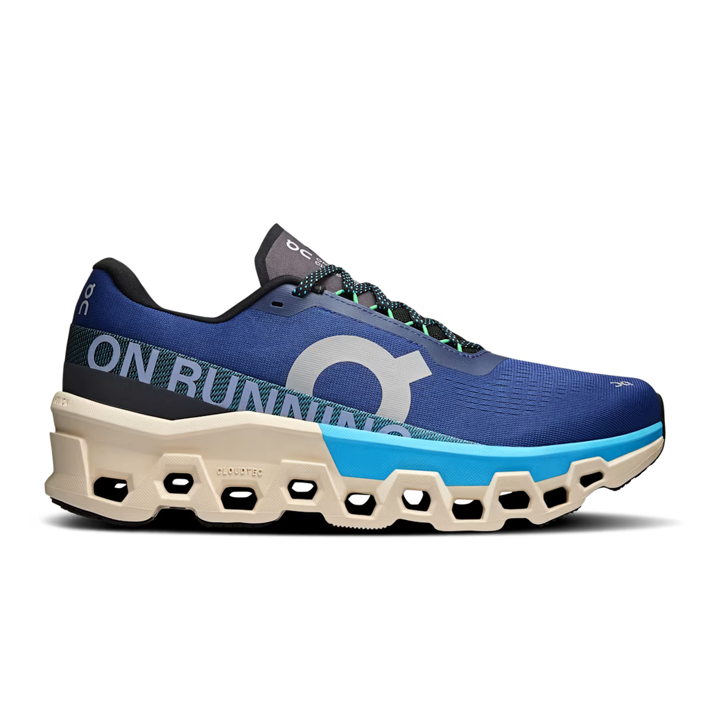 Blue running shoe with a white sole on a white background
