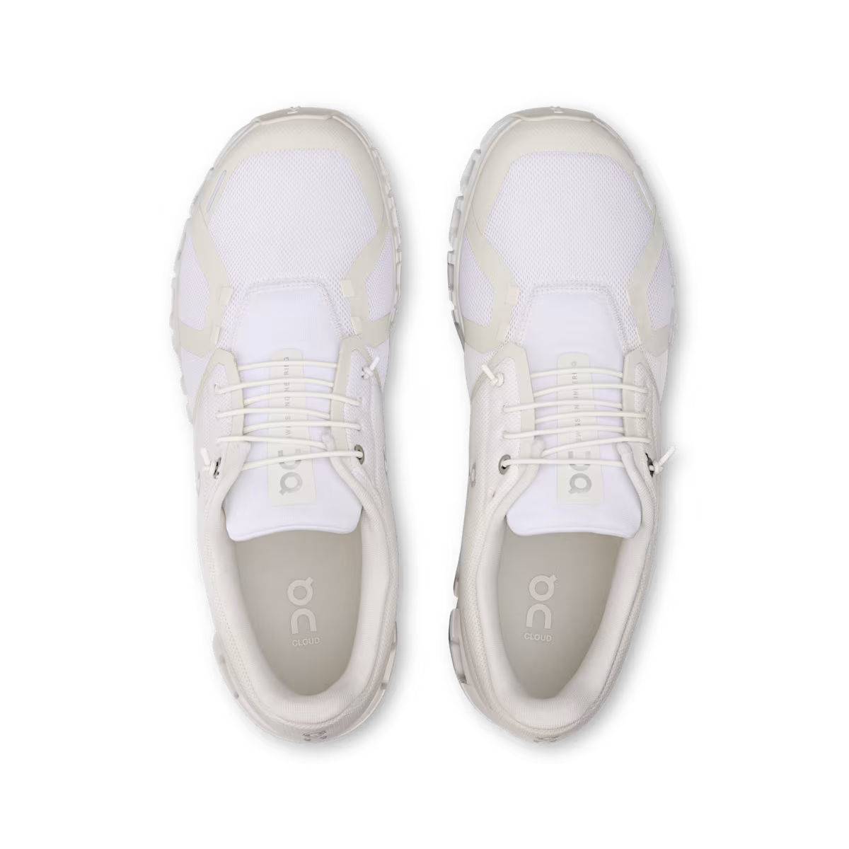 Pair of white sneakers with 'on' branding on a white background