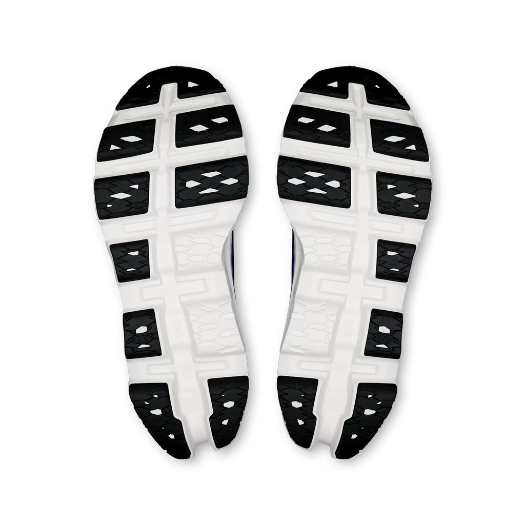Close-up of a white shoe sole with black pattern on a transparent background