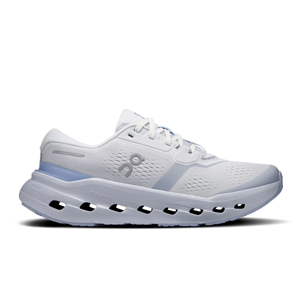 White running shoe with blue accents on a transparent background
