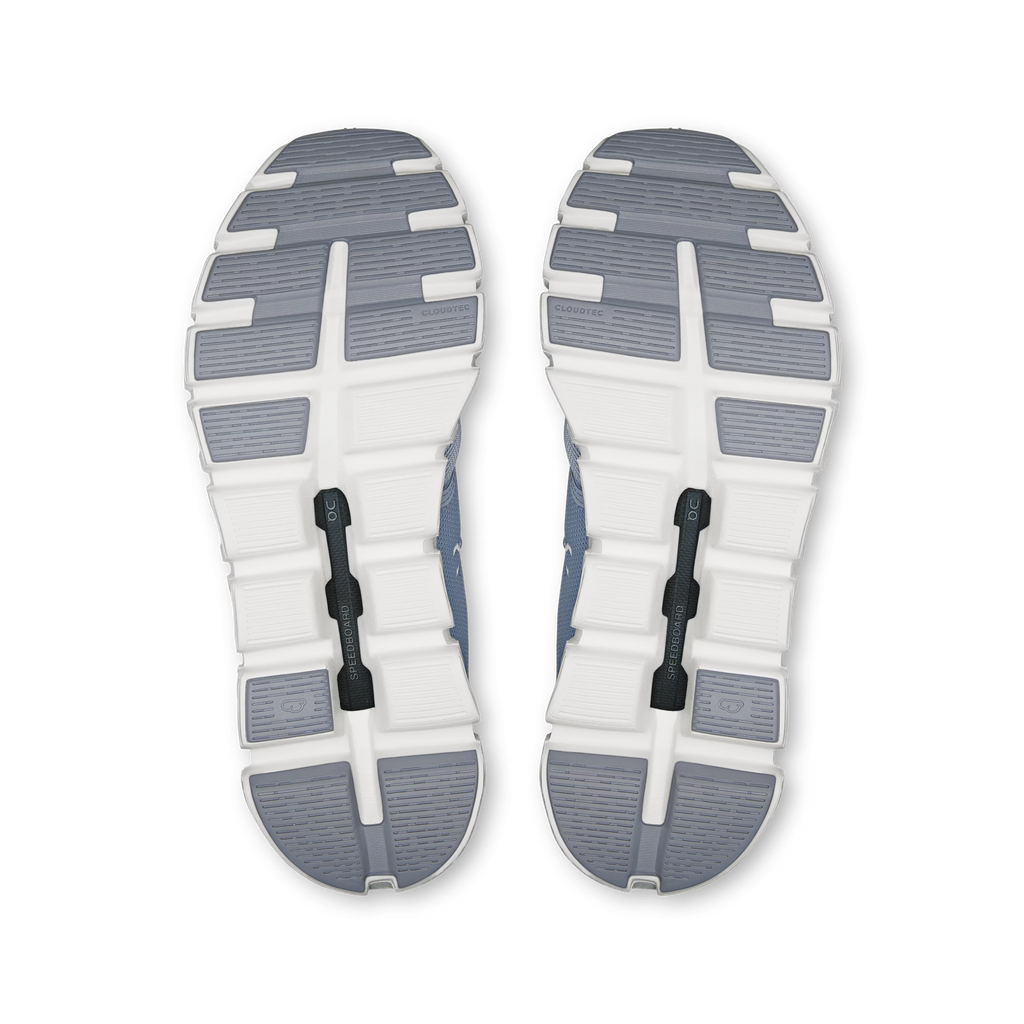 Top view of a pair of shoes with a white sole and gray accents on a transparent background