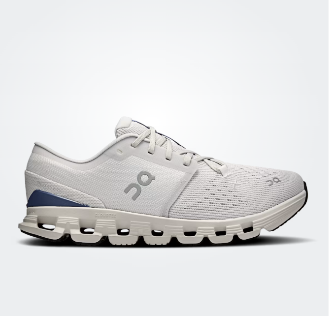 White running shoe with a visible brand logo on a white background