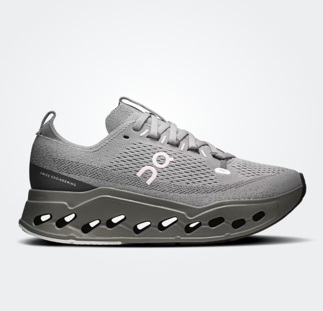 Gray running shoe with brand logo on a white background