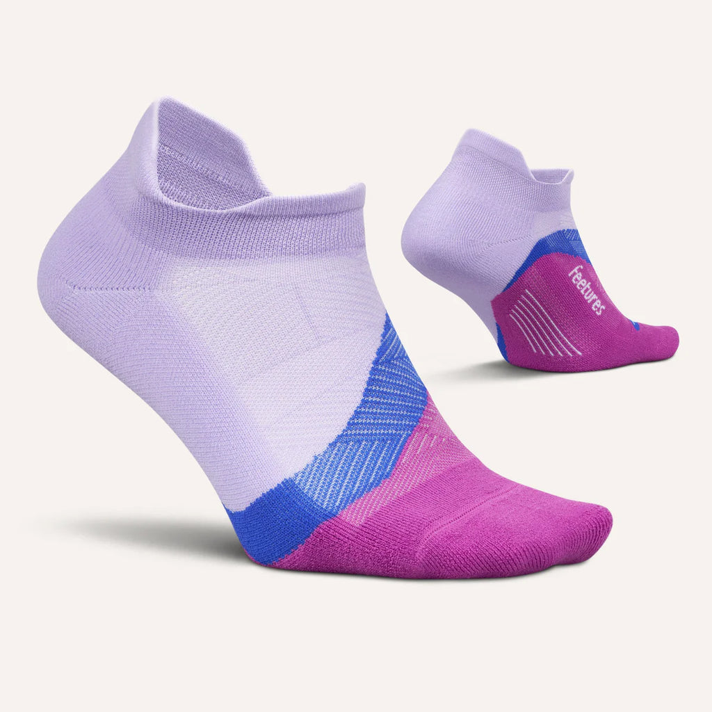 A pair of low-cut athletic socks shown on a light cream background, with one sock in front and another behind it. The front sock is light purple with blue and pink color-blocked panels on the heel and toe.