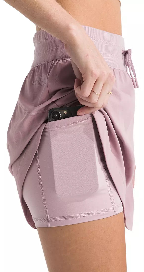 Light purple athletic skirt with a pocket on a white background