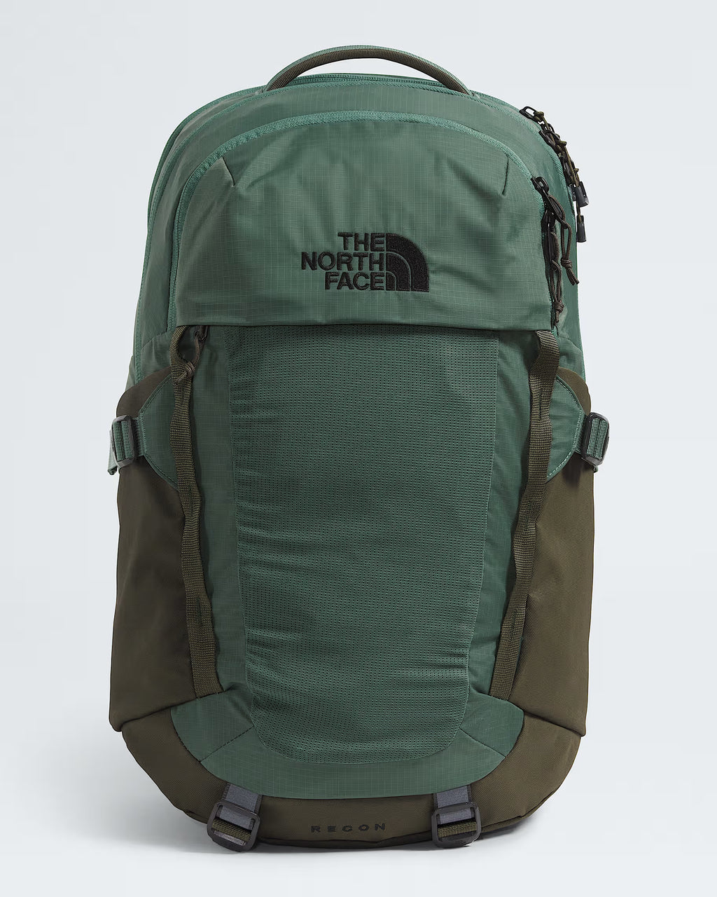 The North Face Regon backpack in green and brown, featuring a top handle, multiple zippered compartments, and side pockets, shown against a light gray background.