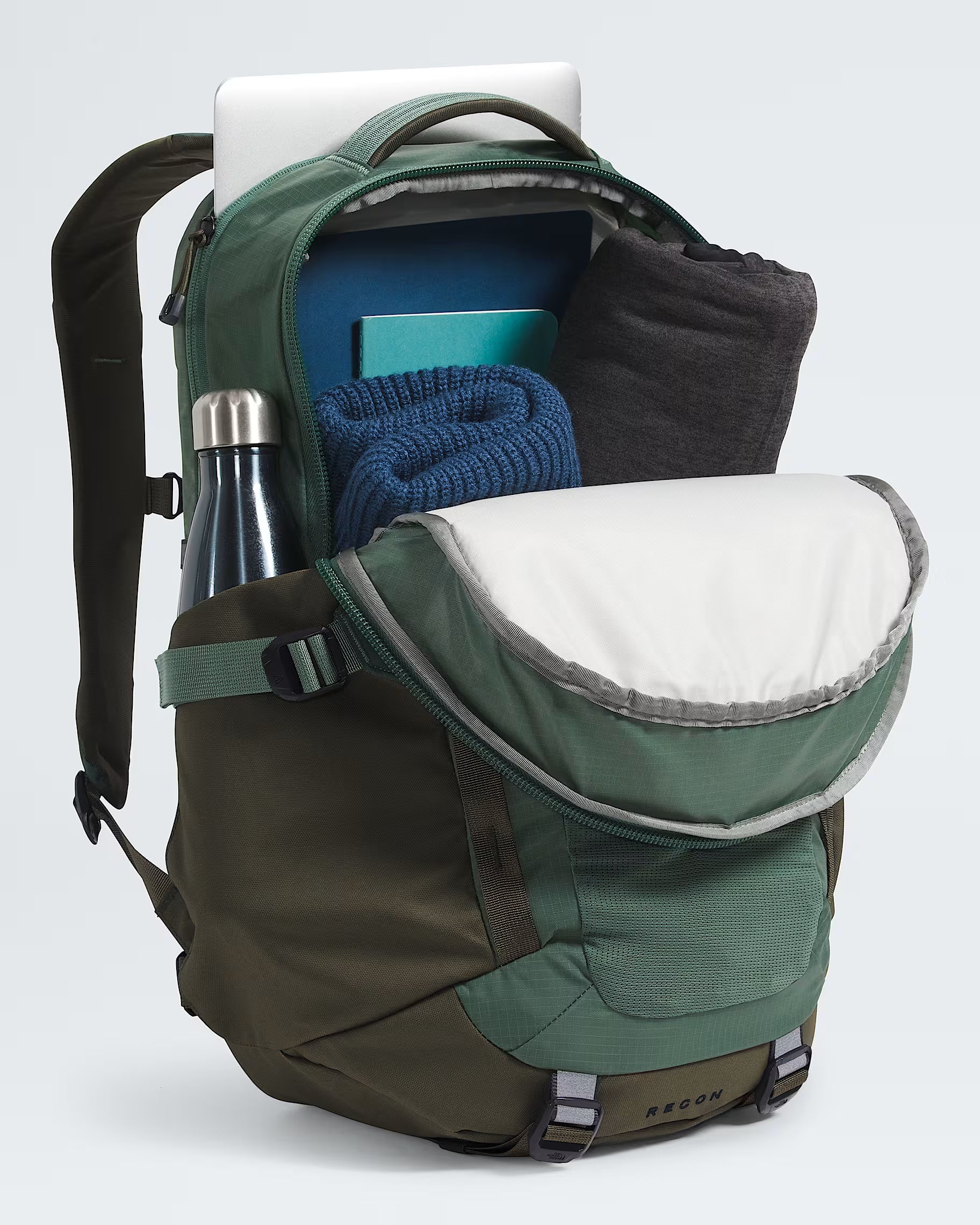 north face backpack olive THE Borealis Commuter Laptop Backpack, Forest Olive/TNF Black-NPF, One Size It boasts a comfortable FlexVent suspension system The North Face Men's Borealis