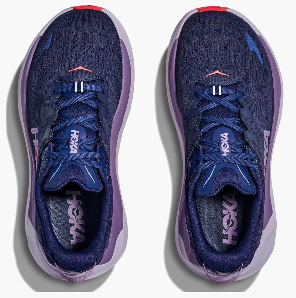 Pair of blue and purple running shoes with visible Hoka branding on a white background
