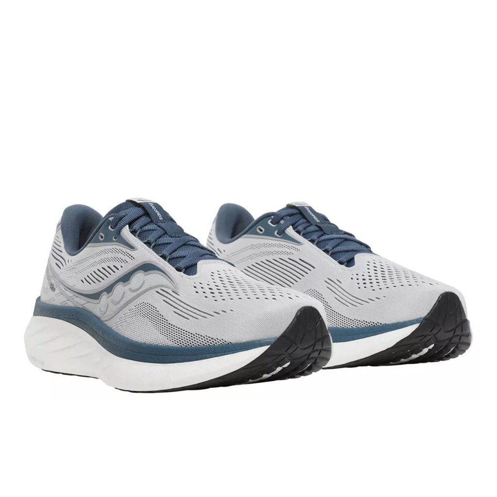 A pair of Saucony running shoes in light gray and navy blue, shown from a three-quarters angle against a plain white background.