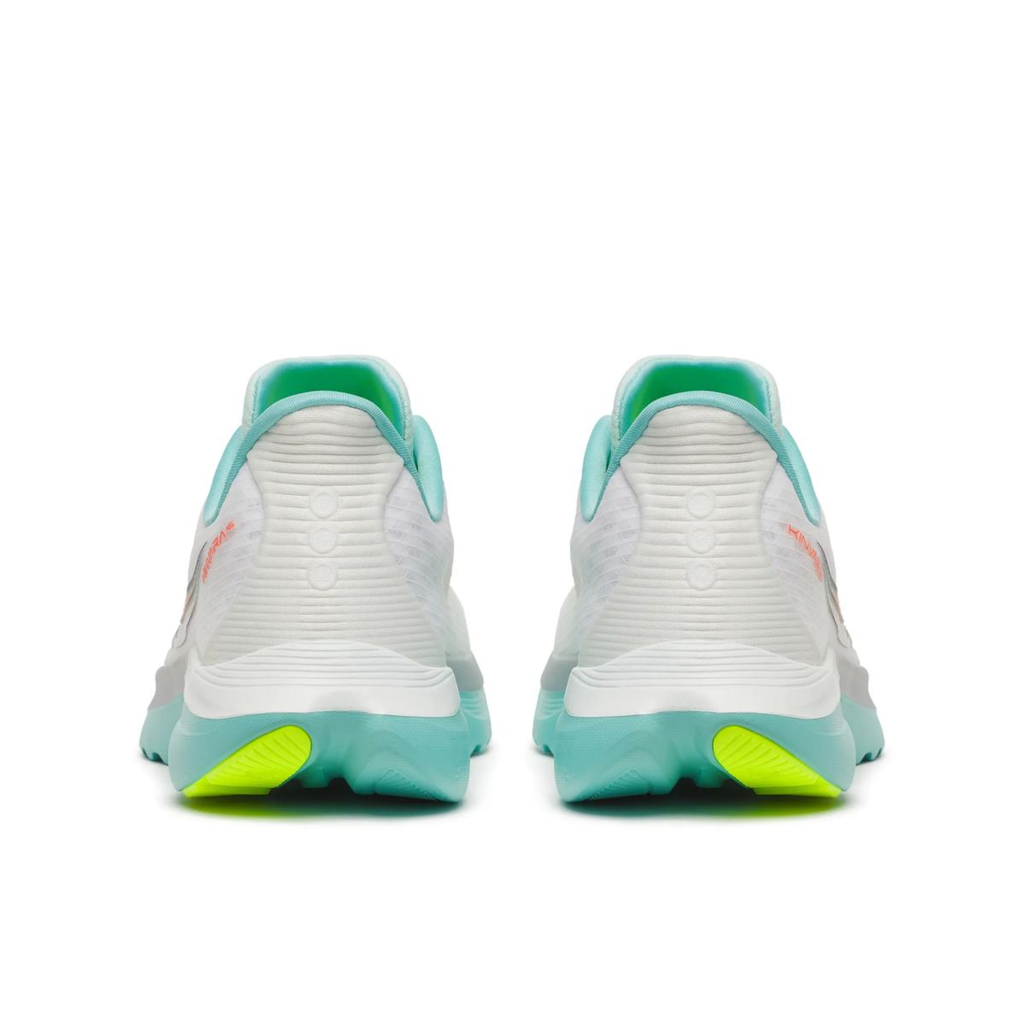 A pair of athletic sneakers shown from the back, featuring a white textured upper, mint green collar lining, and a thick mint green midsole with bright neon yellow accents on the outsole.