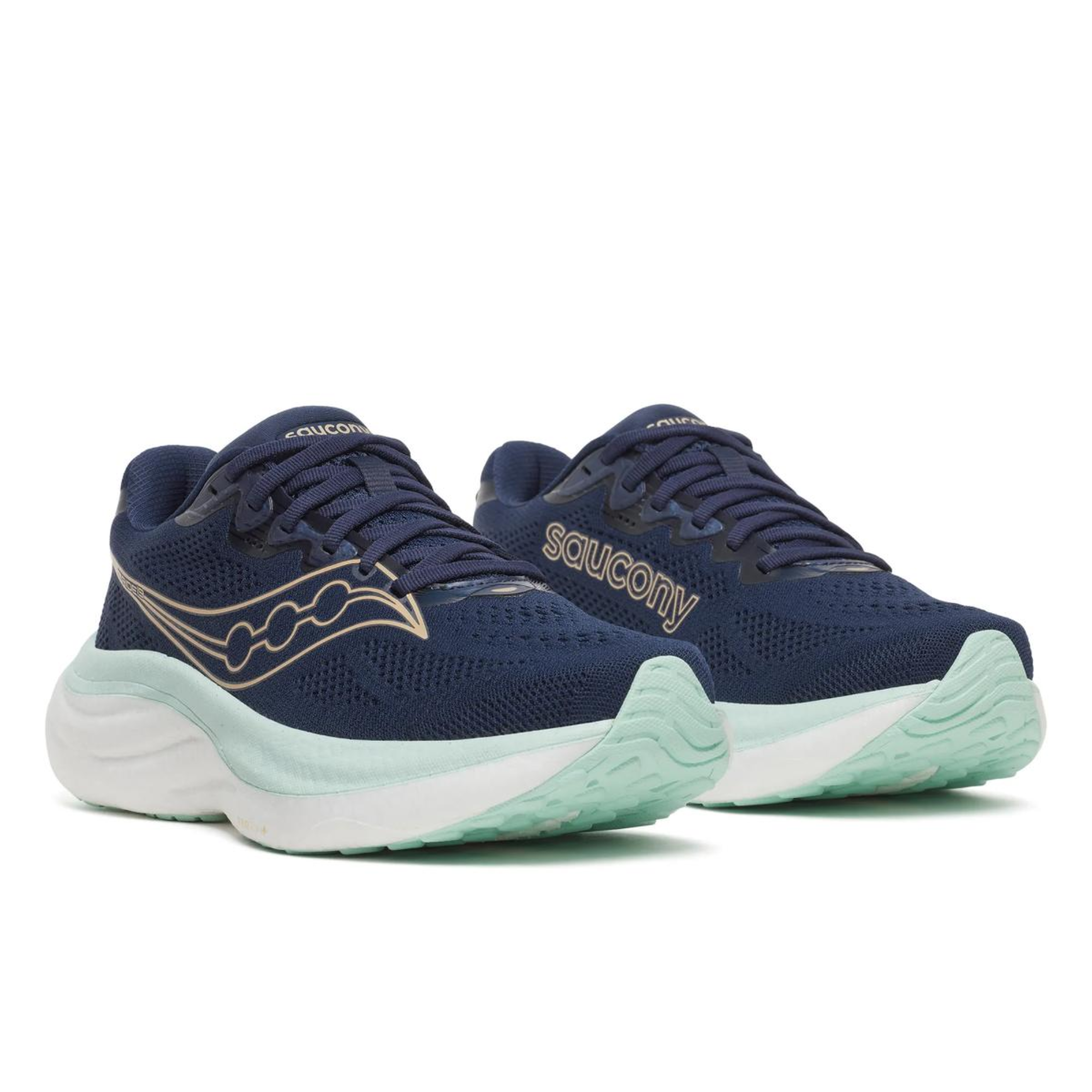 Navy running shoes with white soles on a white background