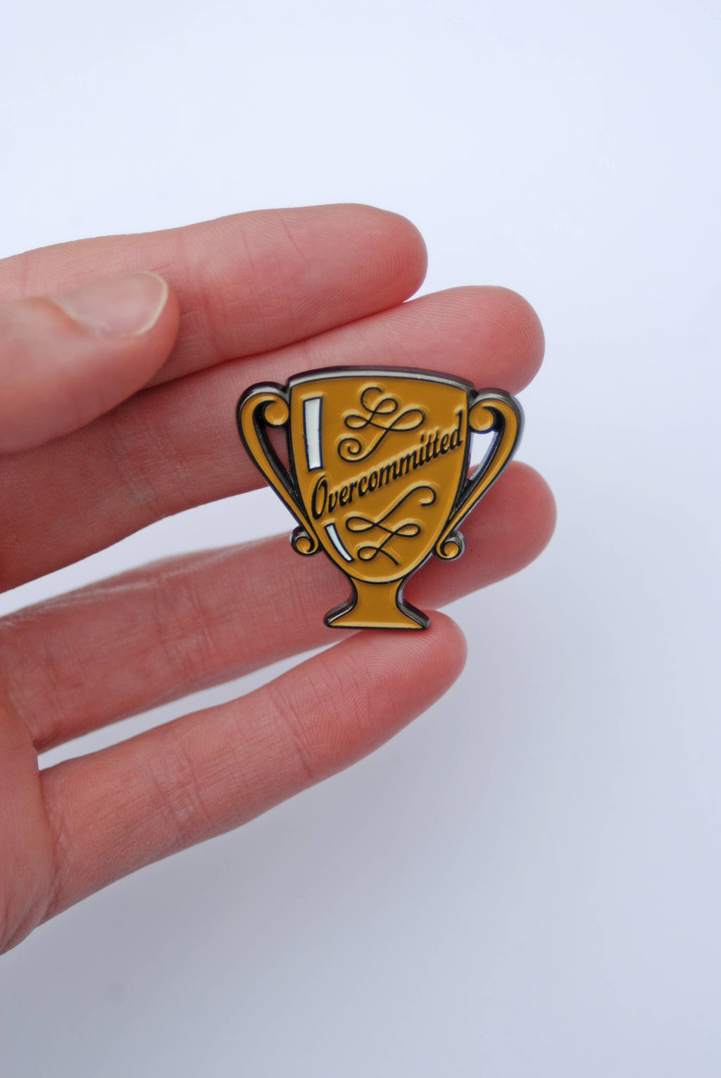 Overcommitted Trophy Enamel Pin