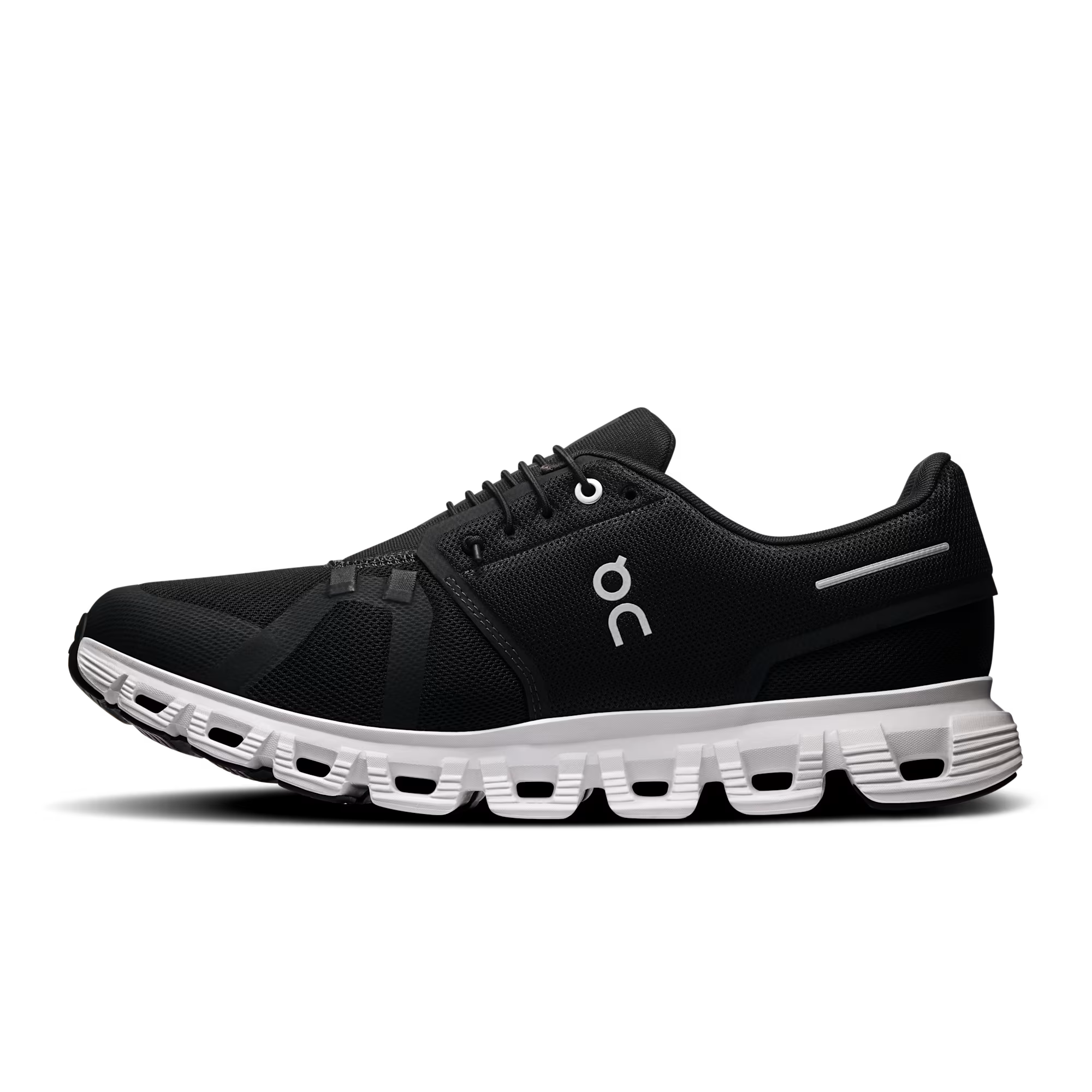 Black running shoe with white sole on a transparent background